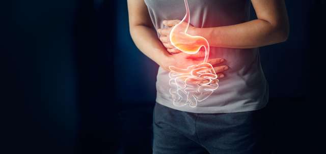 Stomach pain in women who have stomach pain caused by menstrual period, peptic ulcer, appendicitis, or gastrointestinal tract disease. Concept of health care and health insurance A woman feels severe stomach pain.